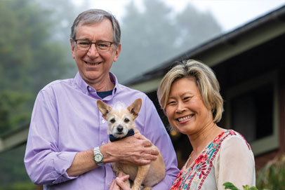 Roger Gilbert ’80M (MD), Lulu Wong, and Their Friend Oscar. Link to their story
