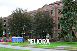 Building with Meliora sign. Links to Gifts of retirement plans
